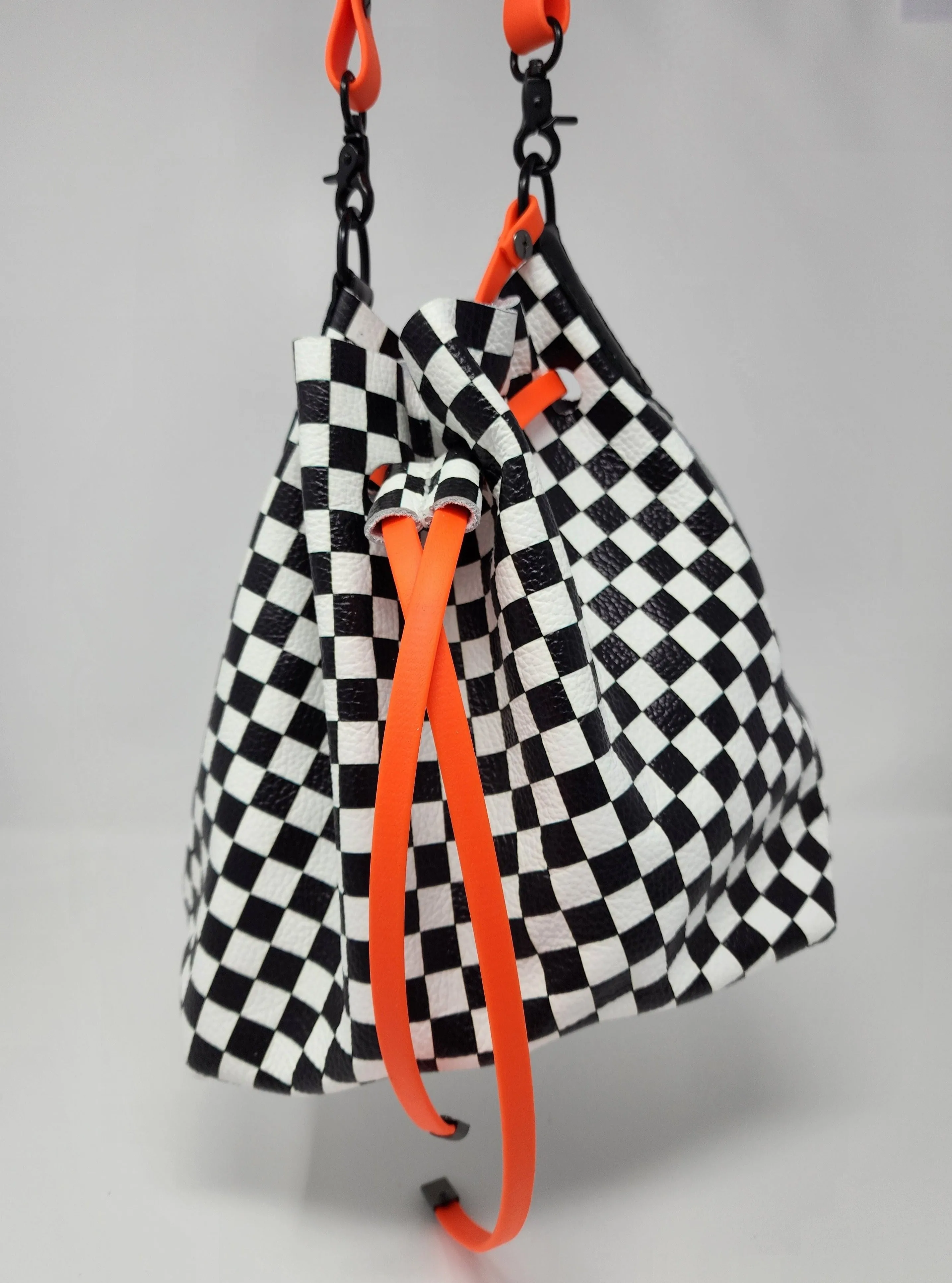 Checkerboard Leather and Neon Orange Drawstring Crossbody Bucket Bag